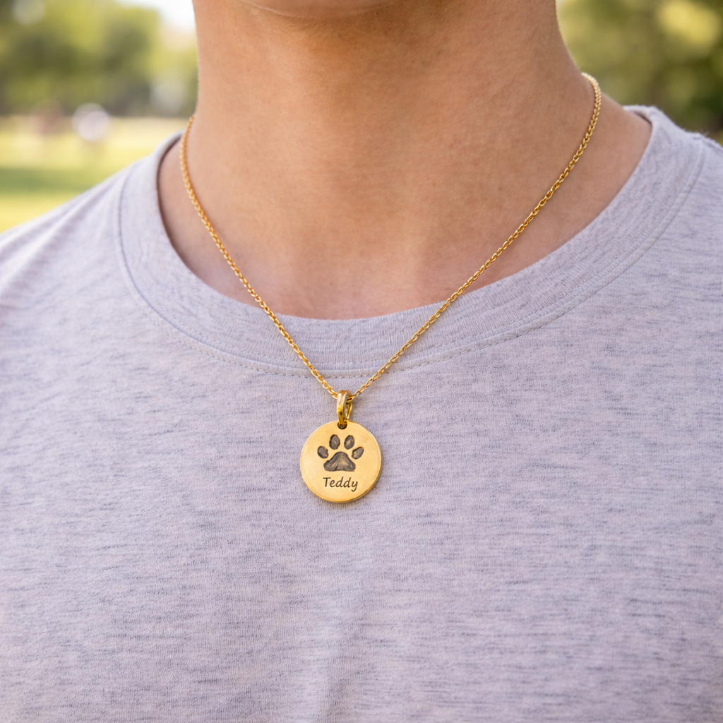 boy wearing Pet paw jewelry necklace