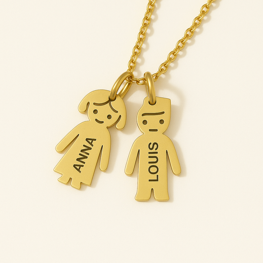 Gold necklace with two child-shaped pendants
